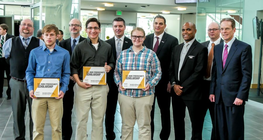 NKU students Nathanael Long and Nick Mester and Allyson Frame (front) received cybersecurity scholarships as part of a partnership between US Bank and NKU.