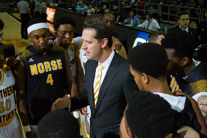 John Brannen give his coach some final words of advice before the Norse face Earlham in the first game of the season.