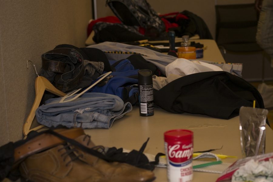 Behind the scenes, models got ready for each set. Clothes everywhere. Members of BWO helped organize the models to keep the event running smoothly. 