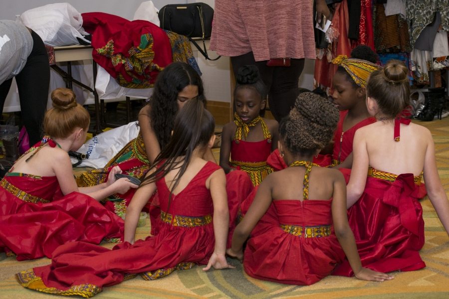 Behind the scenes, models got ready for each set. Clothes everywhere. Members of BWO helped organize the models to keep the event running smoothly. 