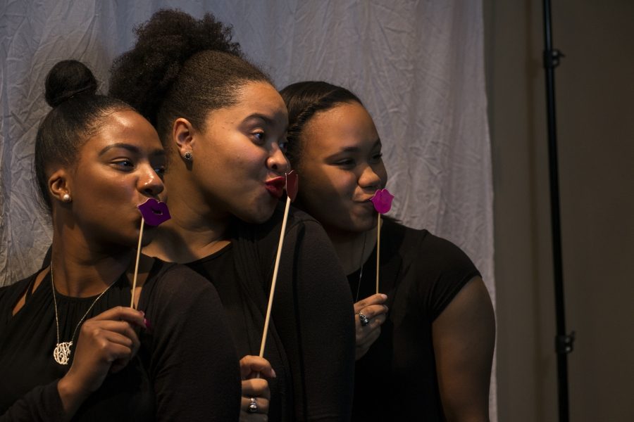 Outside of the SU Ballroom, a photo booth was set up. The booth provided props to pose with. 