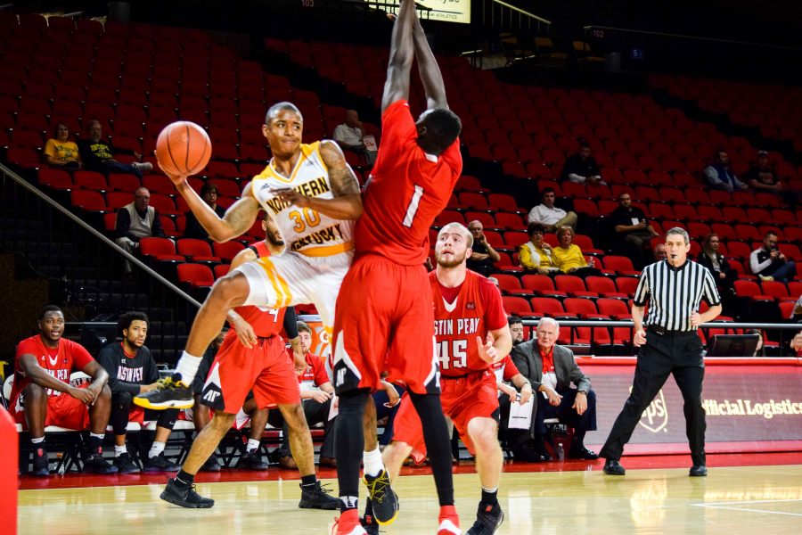 NKUs Lavone Holland II (30) throws a pass during Fridays game against Austin Peay at Miami University.