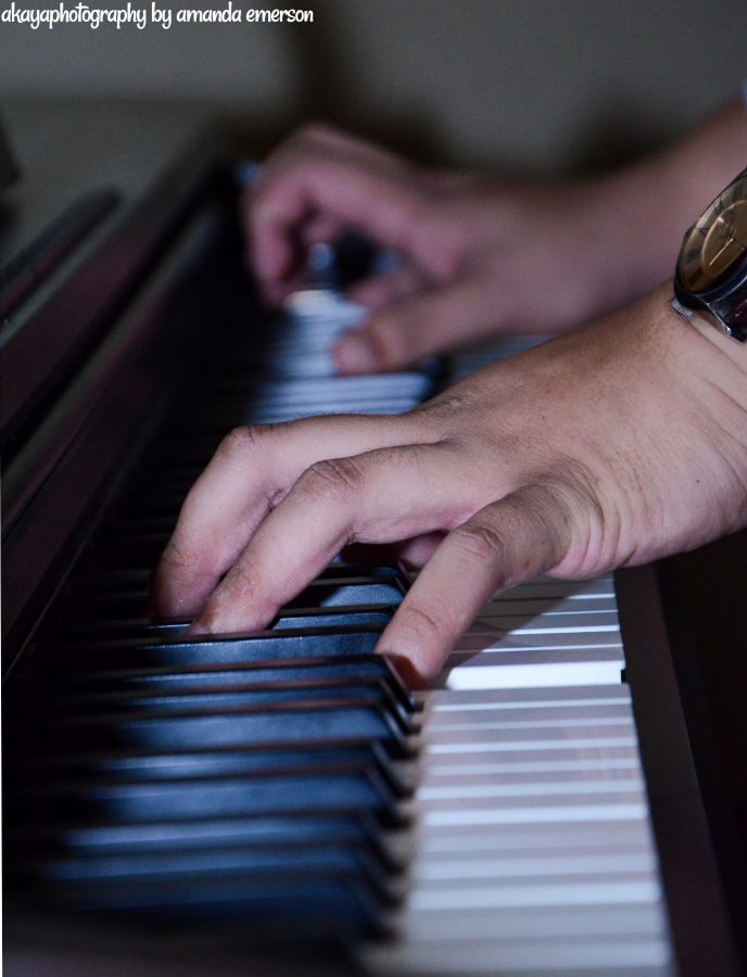 Justin Schmitt plays the piano. He said that the scariest part of starting Clever Records was committing to it. 