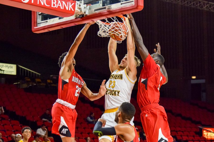 NKUs Carson Williams (23) dunks one home during Fridays game against Austin Peay at Miami University.
