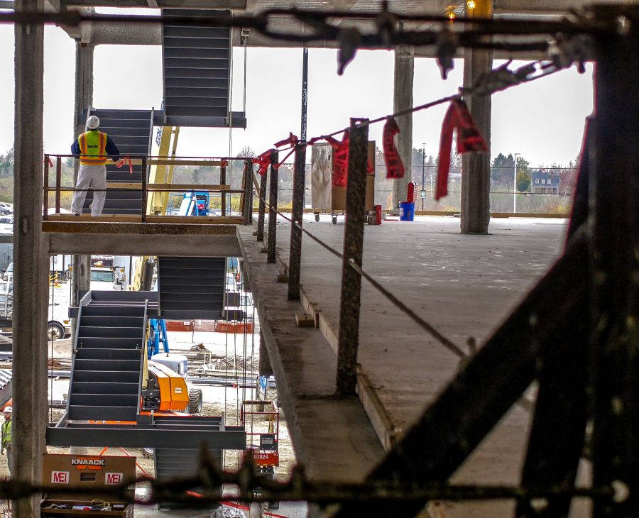 Project manager, Mark Jones, peers up what will be one of the building's stairwells.