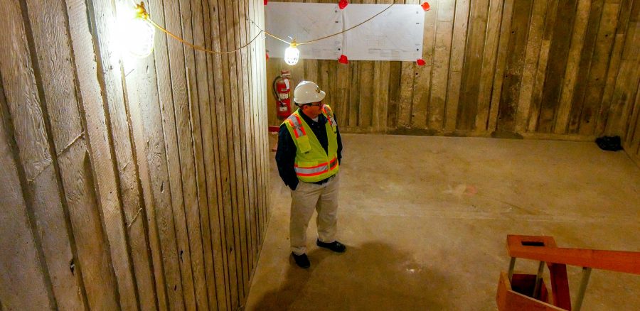 Project manager, Mark Jones gazes through a stairwell of Founder's Hall.