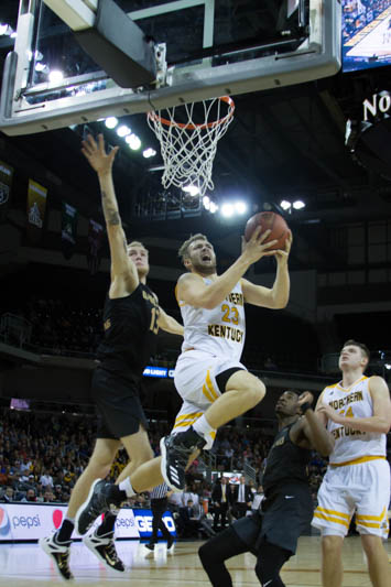 Carson Williams completes a reverse layup against Oakland. The Norse lost 79-70
