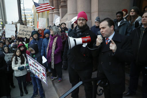 Cincinnati Mayor John Cranley speaks during a demonstration against President Donald Trumps executive order temporarily banning immigrants from seven Muslim-majority countries from entering the U.S. and suspending the nation’s refugee program Monday, Jan. 30, 2017, outside City Hall in Cincinnati. In addition, earlier in the day Cranley declared Cincinnati a sanctuary city, meaning city will not enforce federal immigration laws against people who are here illegally, in keeping with current policy. (AP Photo/John Minchillo)