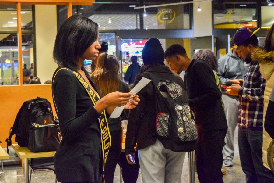 Students held their candlelights as Tracy Stokes, director of AAP&S at NKU, explained how the event connected to pursuing passions. 