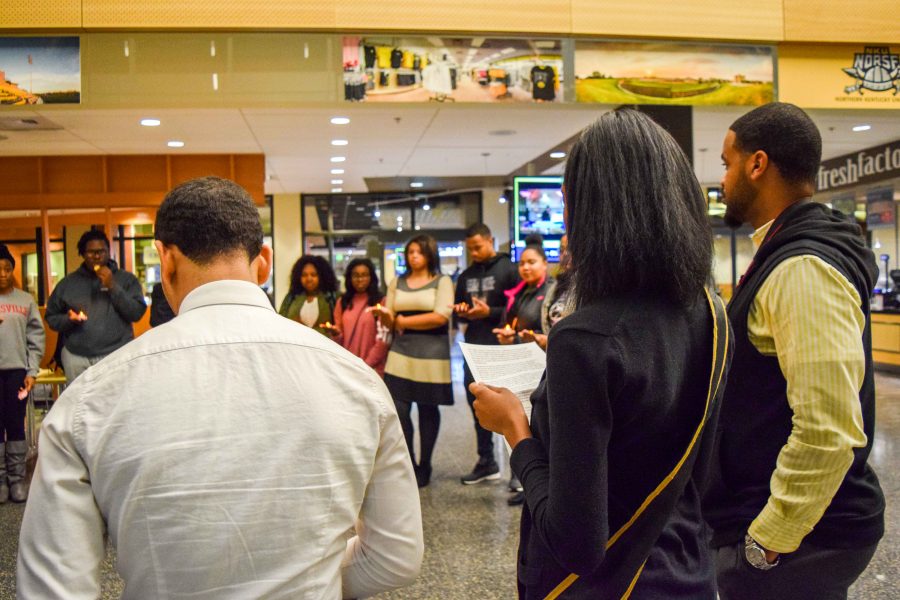 Students held their candles and honored the peace and community. 