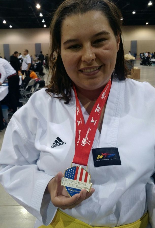 Clara Fightmaster receives a gold medal during the 2016 National Championship in Indiana. 