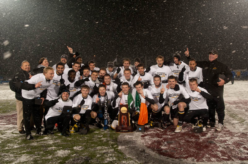 The Norse men's soccer team celebrate on the field in Louisville after winning the 2010 National Championship