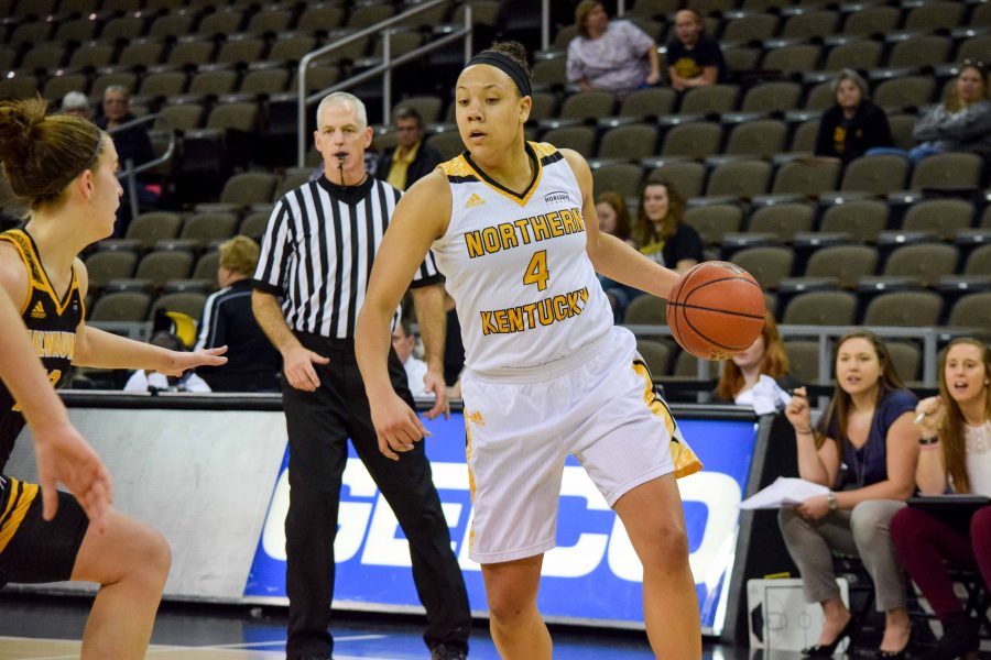 Mikayla Terry (4) goes around a defender during Friday's game against Milwaukee.
