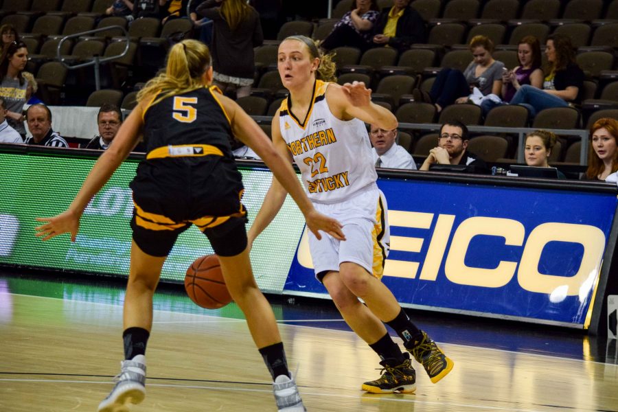 Kelley Wiegman (22) dribbles around a defender during Friday's game against Milwaukee.