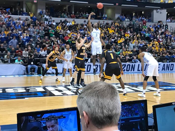 Bam Adebayo wins the opening tip-off over Carson Williams in the first round of the NCAA Tournament