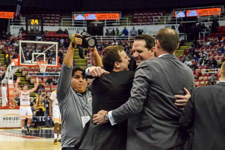 The NKU coaching staff celebrates as the Norse prepare to clinch their first Horizon League championship and NCAA tournament bid.