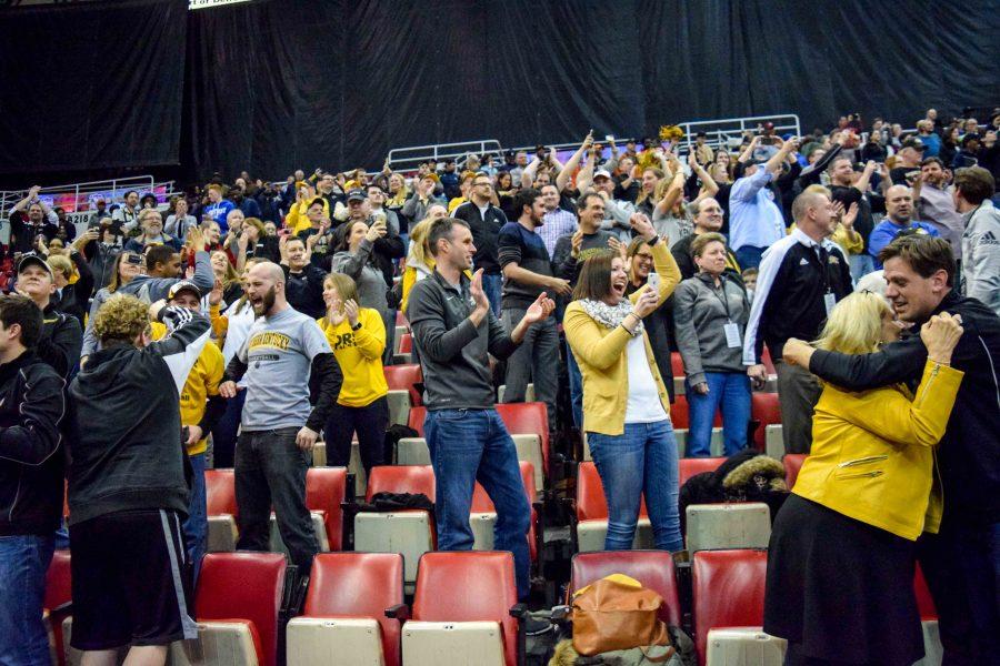 The NKU fans who made the trip to Detroit celebrate the victory.