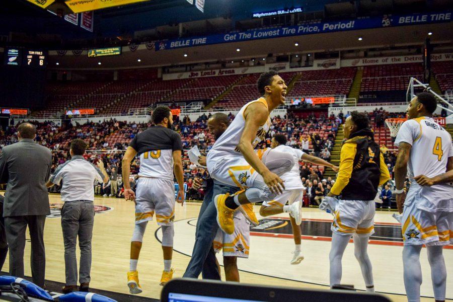 Mason Faulkner (11) and the bench celebrates as the Norse prepare to clinch the victory.