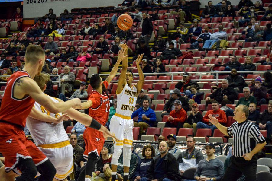 Mason Faulkner (11) shoots a three during Monday's Horizon League semifinal win over Youngstown State.