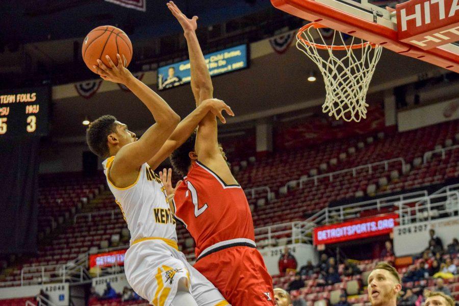 Mason Faulkner (11) goes up for a shot during Monday's Horizon League semifinal win over Youngstown State.