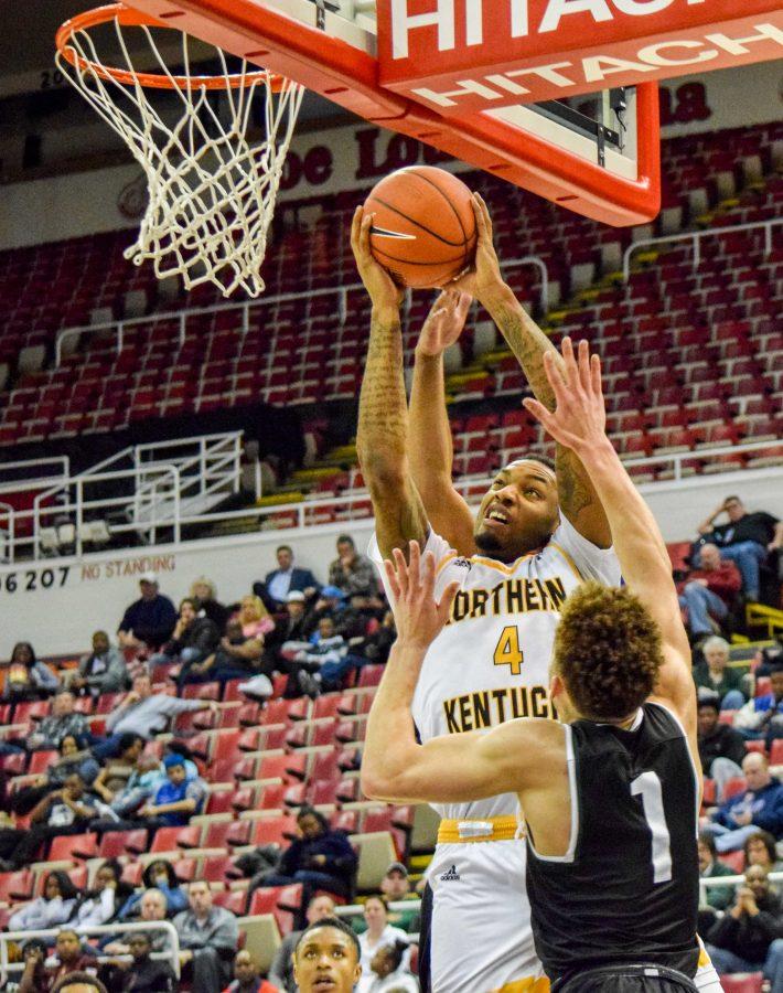 Jeff Garrett (4) goes to the basket during Sunday's Horizon League quarterfinal win over Wright State.
