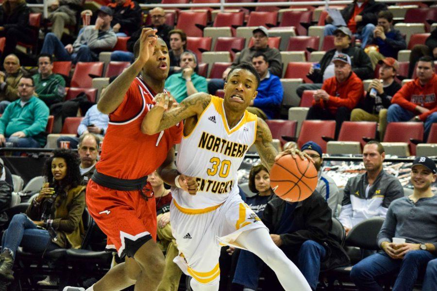 Lavone Holland II (30) drives around a defender during NKUs Horizon League semifinal win Monday night over Youngstown State.