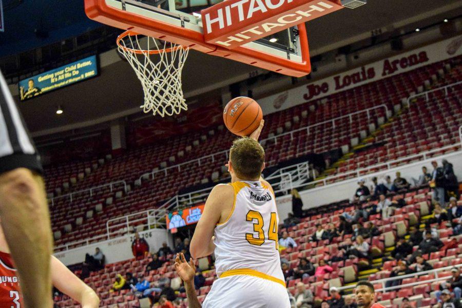 Drew McDonald (34) goes up for a reverse during Monday's Horizon League semifinal win over Youngstown State.