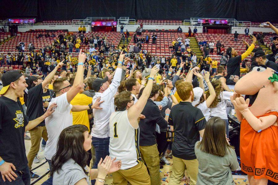 NKU students rush the state to celebrate with the mens basketball team.