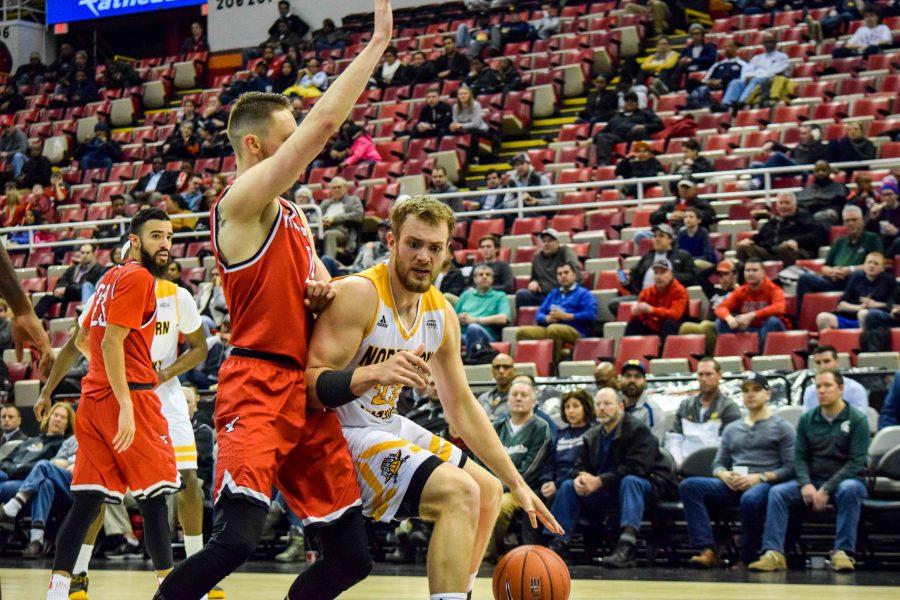 Carson Williams (23) drives the baseline during Mondays Horizon League semifinal win over Youngstown State.