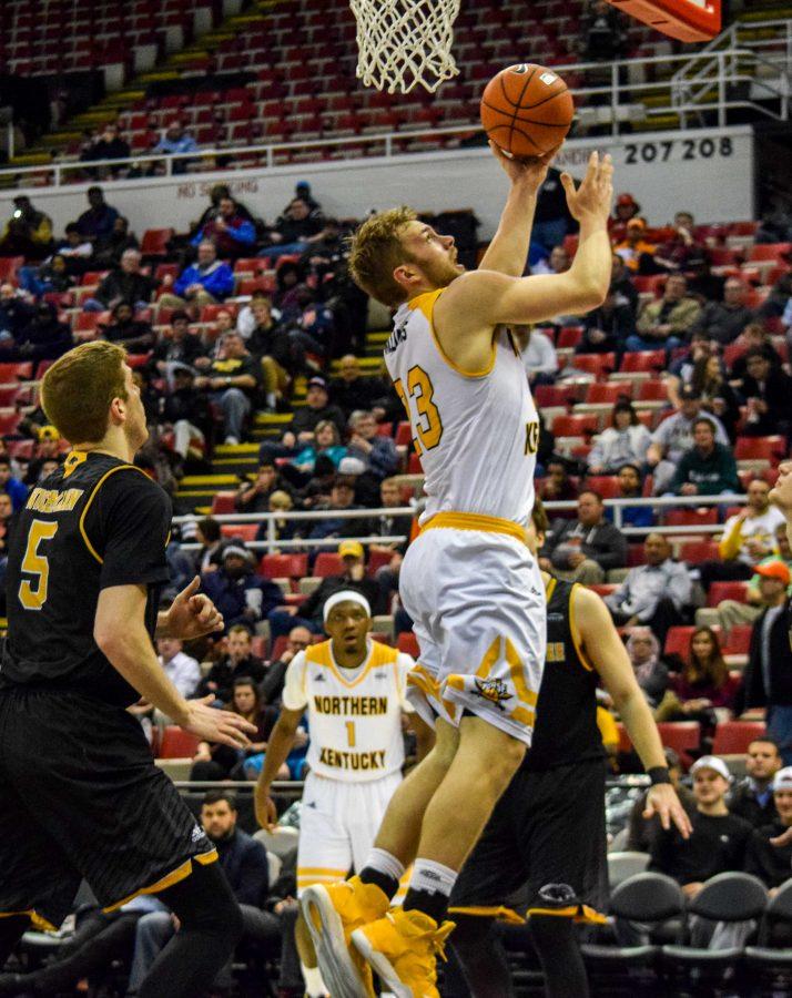 Carson Williams (23) goes up for a shot during the Horizon League championship game against Milwaukee.