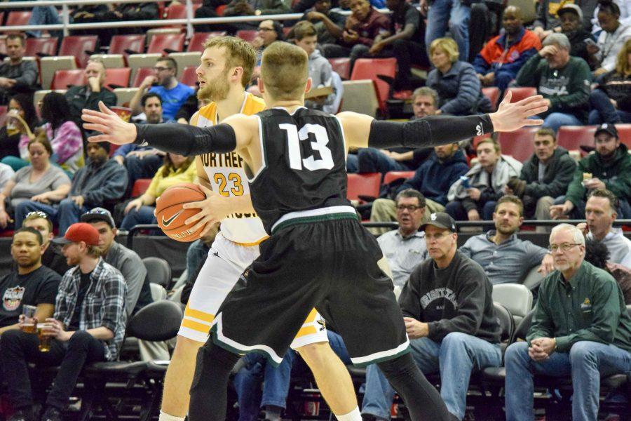 Carson Williams (23) looks for a teammate during Sunday's Horizon League quarterfinal game against Wright State.