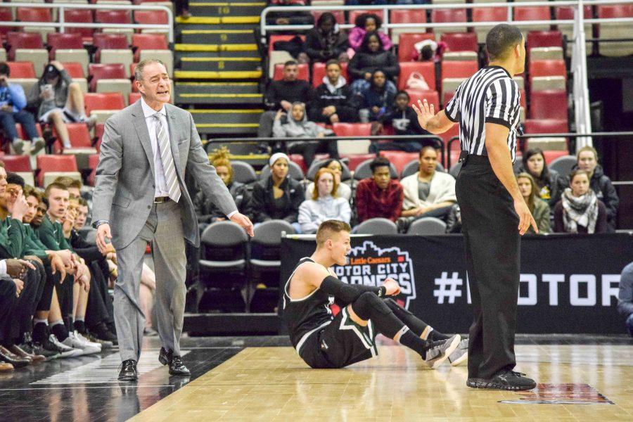 Wright State head coach Scott Nagy (left) argues a call during Sunday's Horizon League quarterfinal game against NKU.