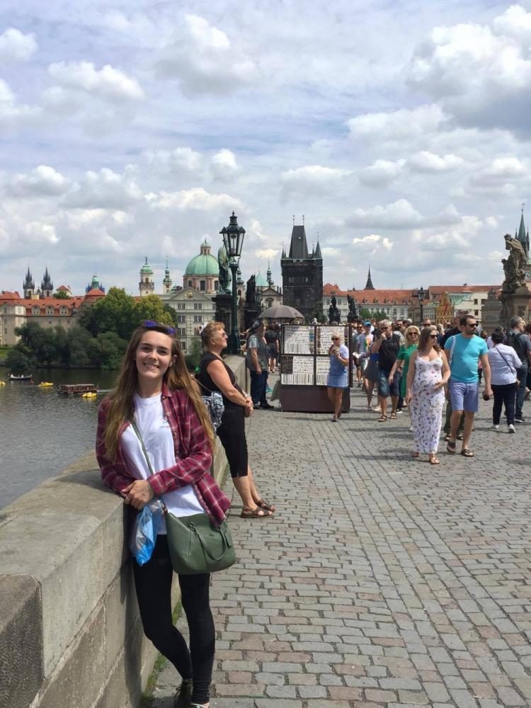 Helton posing for a photo on her summer trip through the KIIS Munich program.