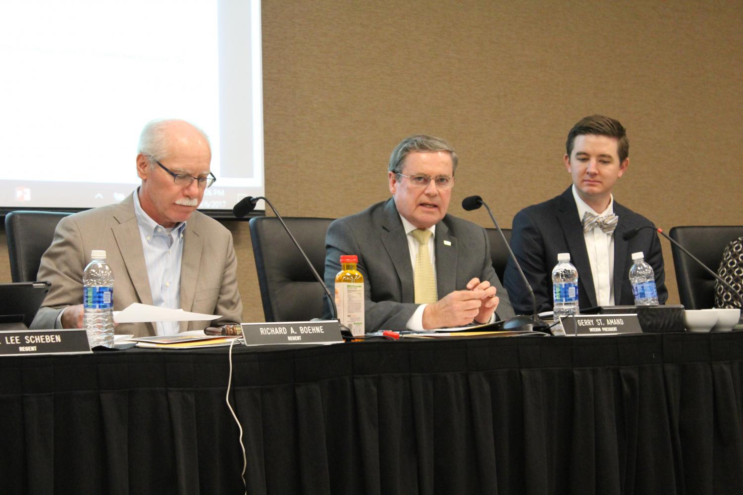 Gerard St. Amand, center, at a Board of Regents meeting Sept. 6. A bill passed April 26 that freezes NKUs pension contribution rate for one year.