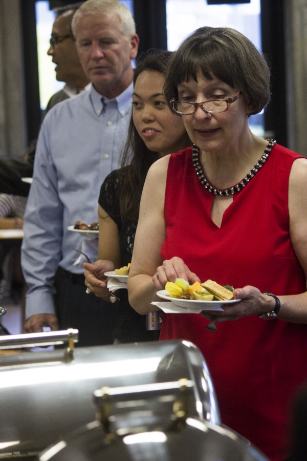 Snack food was served at the casual affair where both students and faculty mingled. 