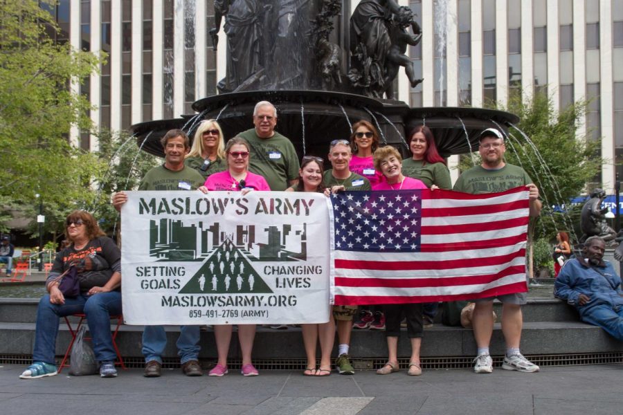Maslow's Army was formed in October of 2016 by Susan and Samuel Landis (center).