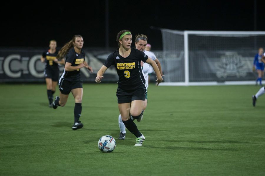 Macy Hamblin (3) looks to pass a ball to a teammate upfield