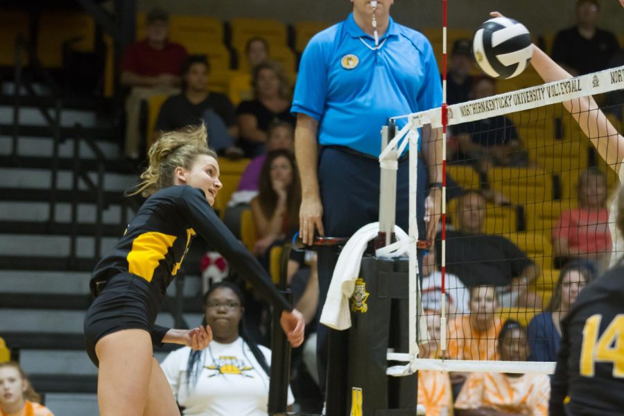 Haley Libs (4) hits the ball in the game against Milwaukee