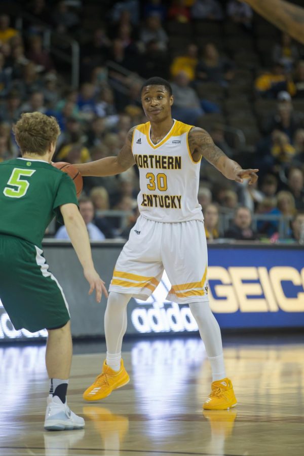 Lavone Holland II (30) dribbles the ball down the court in the game against Wilmington.