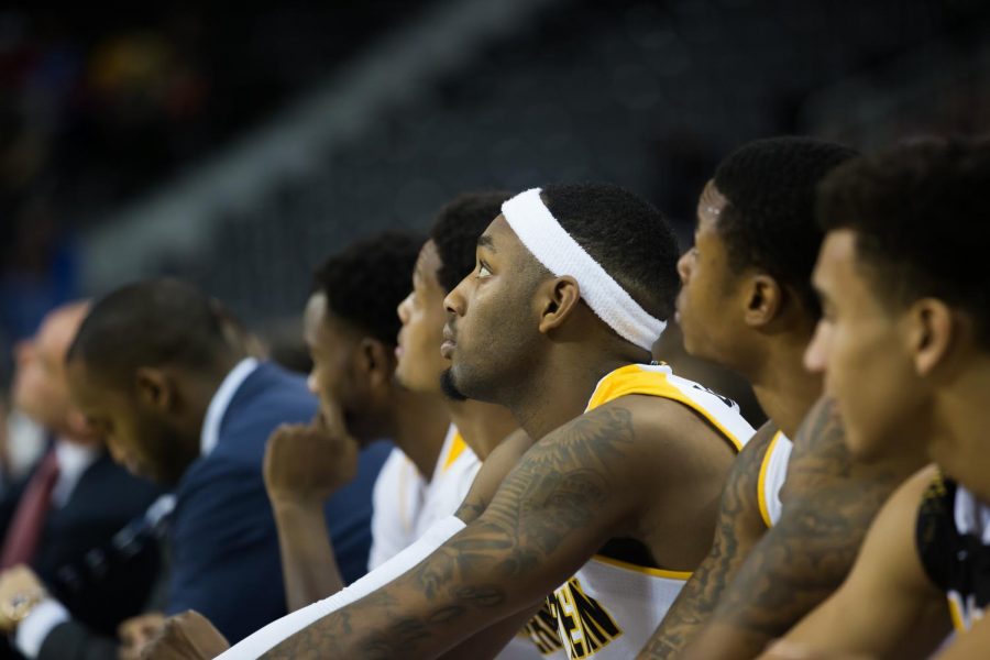 Jeff Garrett and the Norse watch the game against Wilmington. The Norse won 93-65.