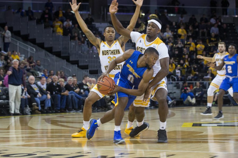 NKU players guard a Morehead State player. The Norse won 86-49.