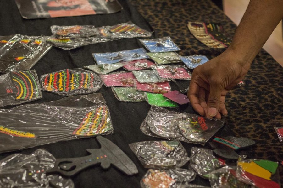 Booths were set up in the back of University Ballroom for merchants to sell item such as earrings, table settings, and necklaces.
