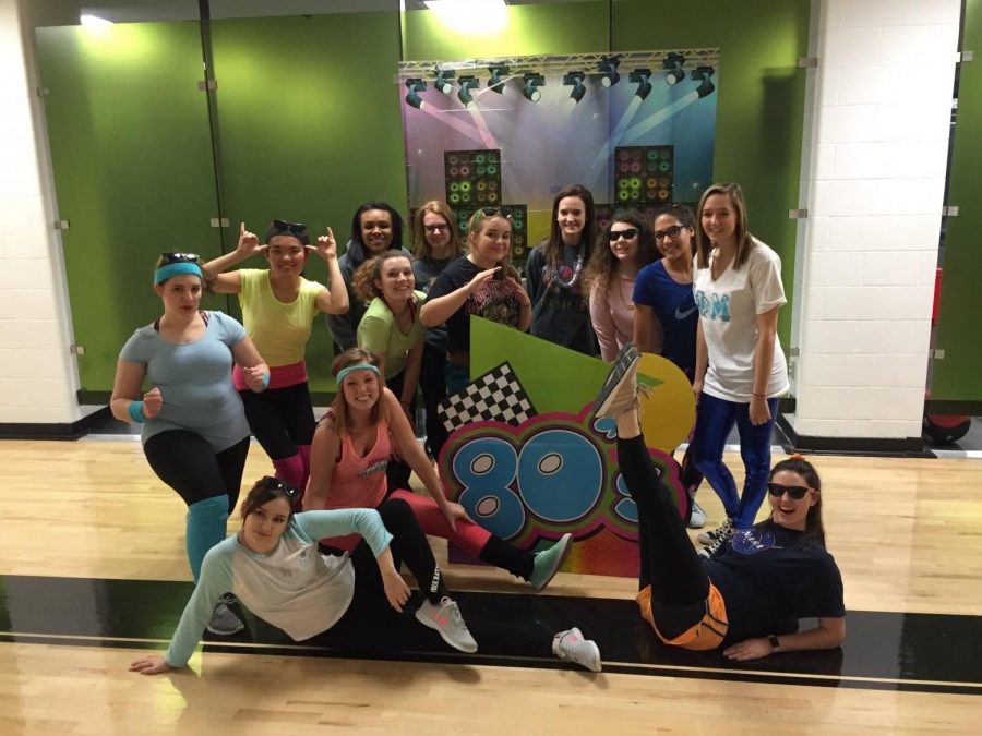Neon-clad students waxed (and flexed) nostalgic at an 80s Aerobics session.