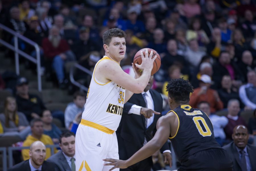 Drew McDonald (34) looks for a teammate to pass to in the game against Milwaukee.