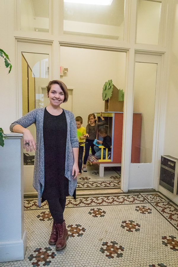 Rust-Jordan at the Welcome House with the little library Howard Scripps commissioned her to make after winning a sculpture contest in 2015.