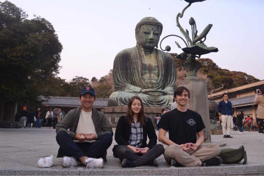 Austin Mayfield (left), Rika Hoffman (middle), and her cousin Shunya Minomo (right), posing in front of the Great Buddha in Kamakura, Japan.