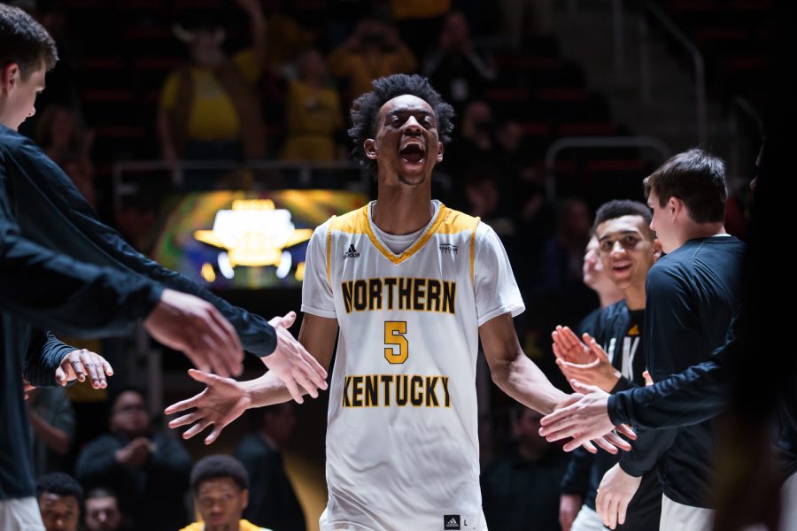 Jalen Tate (5) gets introduced before the game against Cleveland State at Little Caesars Arena.