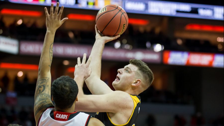 Drew McDonald (34) goes up for a shot during the game against Louisville, March 13 2018.