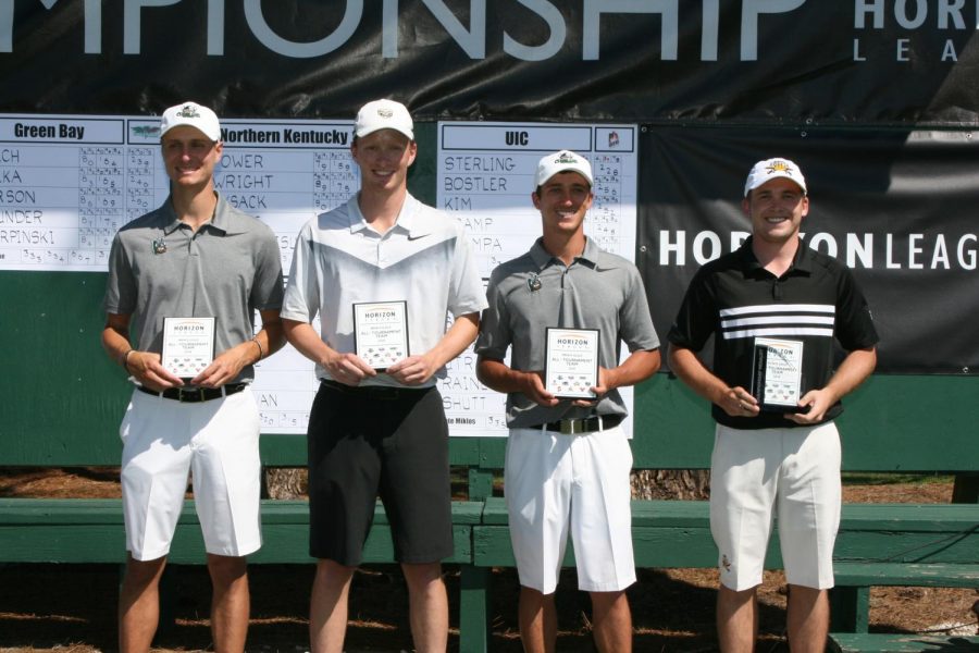 Jacob Poore stands with his fellow competitors at the end of the Horizon League golf tournament