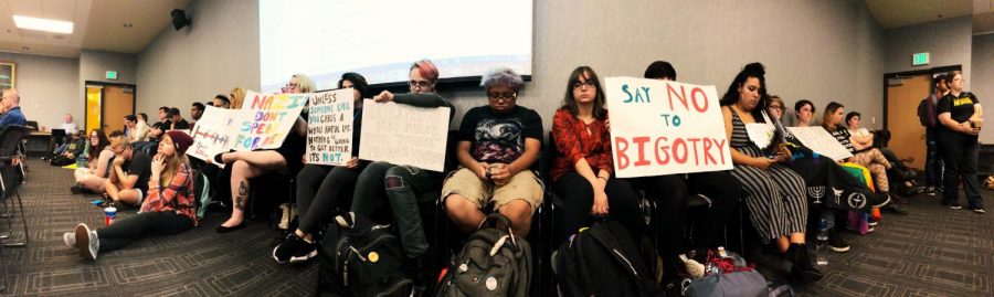 Students, campus LGBTQ group representatives protested a Student Government Association judicial appointment at SGA's Sept. 17 meeting.